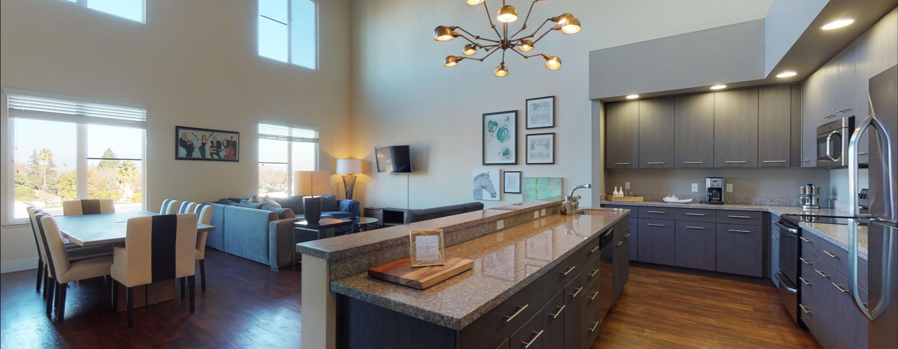 a kitchen with a marble island
